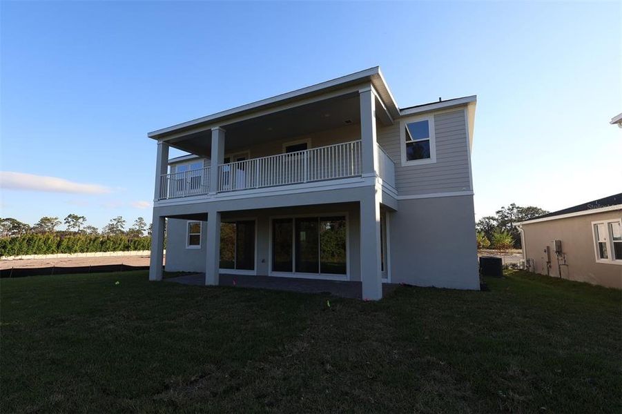 Exterior details and patio area of a home in Center Lake on the Park, St. Cloud (Image 3).