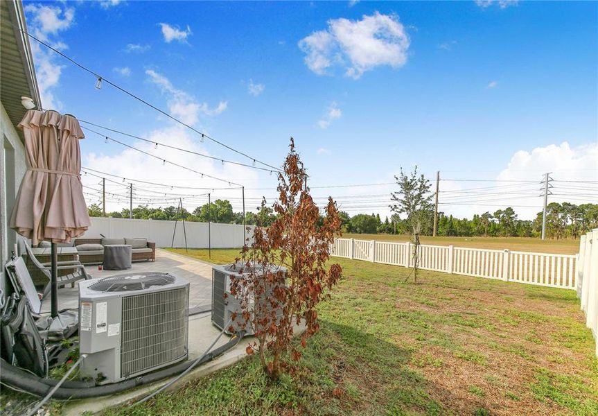 Exterior details and patio area of a home in Wind Meadows South, Bartow (Image 31).