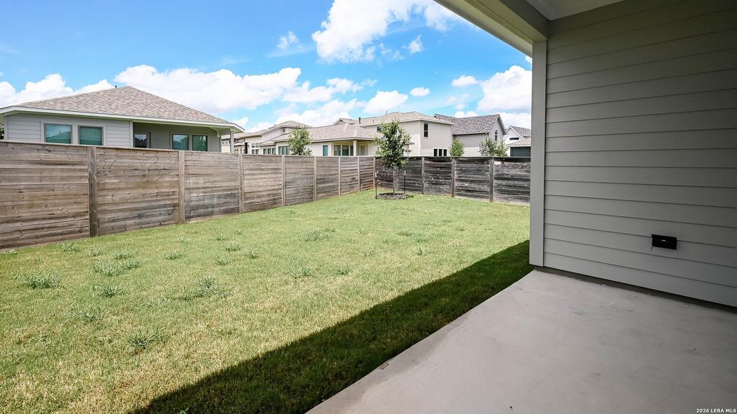 Exterior details and patio area of a home in Solms Landing, New Braunfels (Image 3).