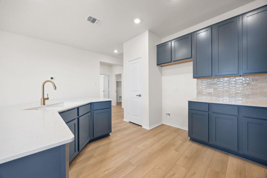 Furnished interior view inside a new home in Salerno - Classic Collection, Round Rock (Image 6). Furnished interior view inside a new home in Salerno - Classic Collection, Round Rock (Image 6).