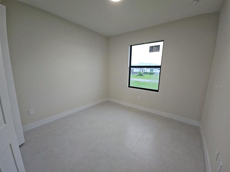 Spacious, unfurnished interior of a new home in , Port Charlotte (Image 32).