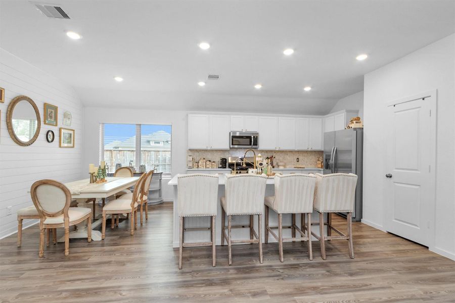Kitchen and dining area showing large center island