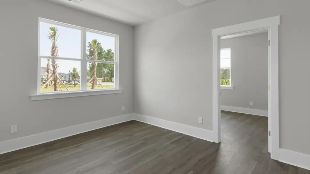 Spacious, unfurnished interior of a new home in The Retreat at Indigo Preserve Townhomes, Leland (Image 12).