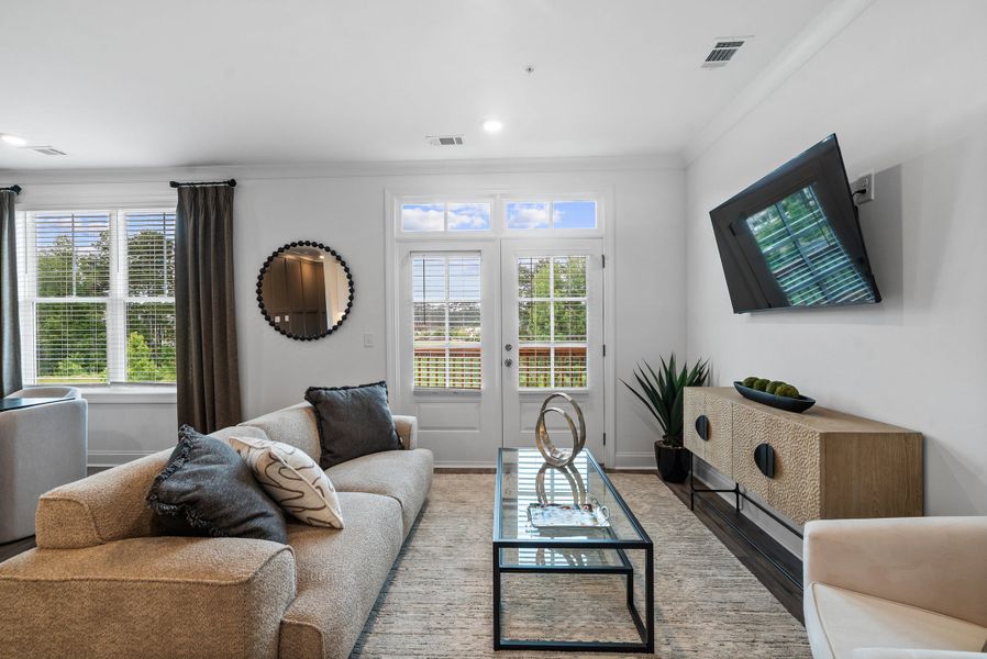 Representative furnished interior of a home built from the The Magnolia by The Providence Group in Market Square at Sawnee Village, Cumming (Image 30).