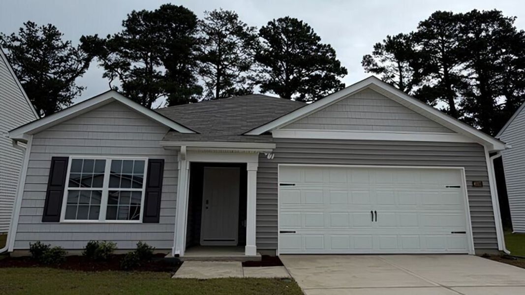 Front exterior of a new home in Madeline Farm, New Bern, NC, highlighting curb appeal (Image 1). Front exterior of a new home in Madeline Farm, New Bern, NC, highlighting curb appeal (Image 1).