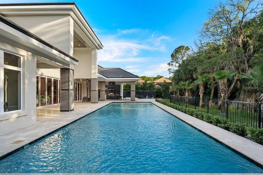 Exterior details and patio area of a home in , Ormond Beach (Image 29).