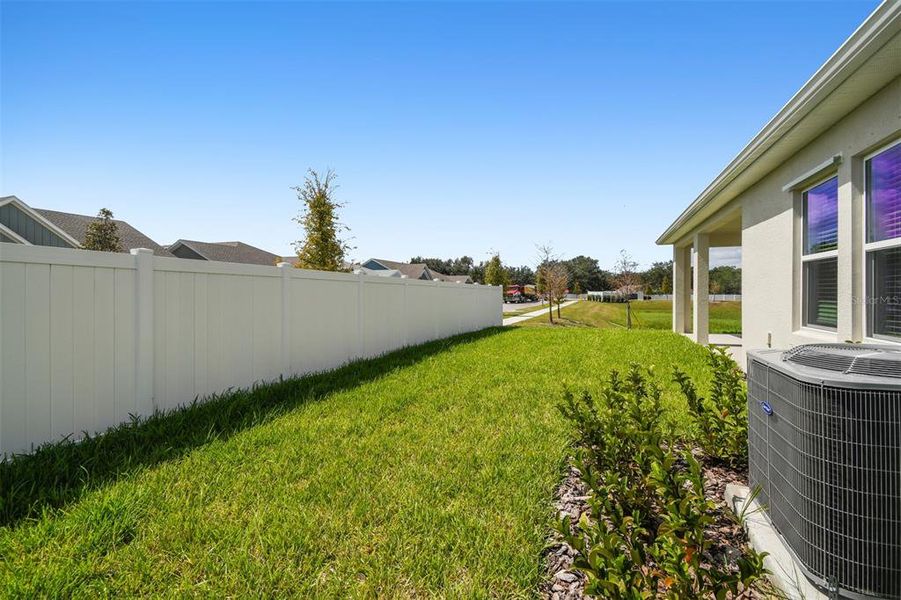 Exterior details and patio area of a home in The Peninsula at Rhodine Lake, Riverview (Image 27). Exterior details and patio area of a home in The Peninsula at Rhodine Lake, Riverview (Image 27).