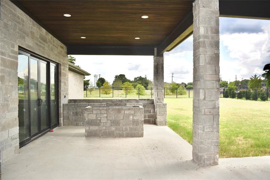 View of patio with outdoor kitchen