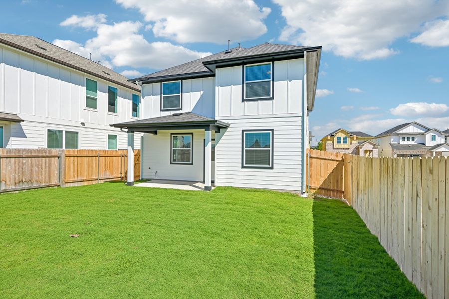 Exterior details and patio area of a home in Porter Country, Buda (Image 14).