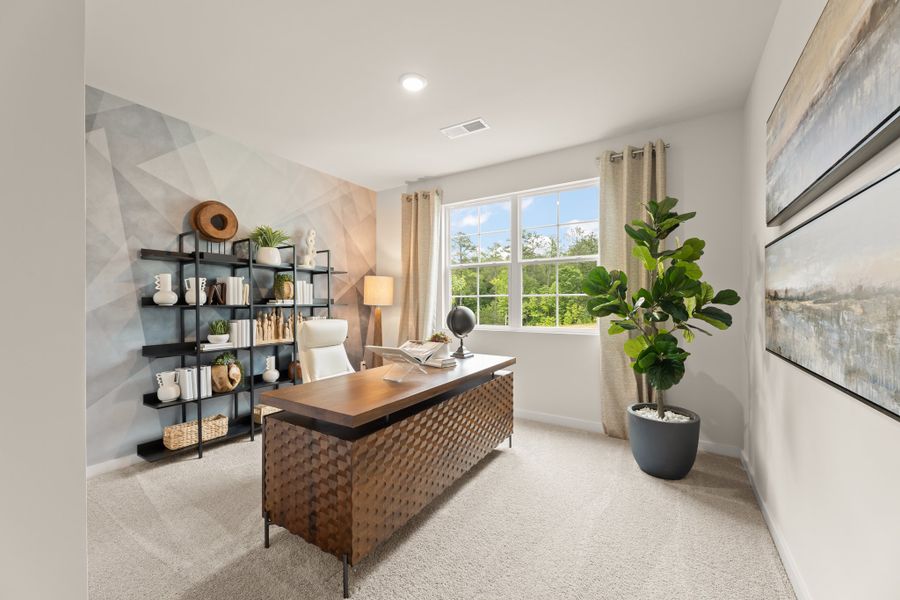 A room with a table and shelves. A room with a table and shelves.