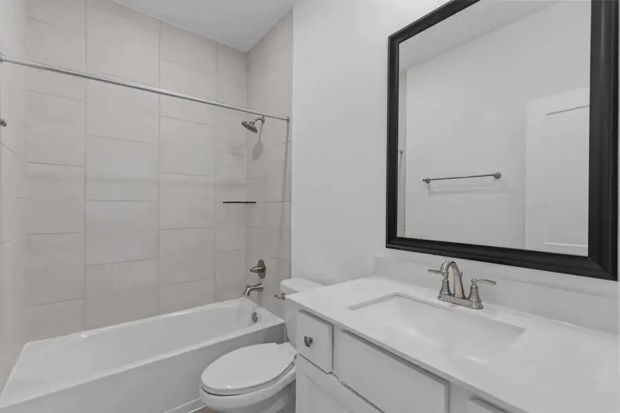 Representative furnished interior of a home built from the Oakdale by Chesmar Homes in Bridgeland, Elgin (Image 5).