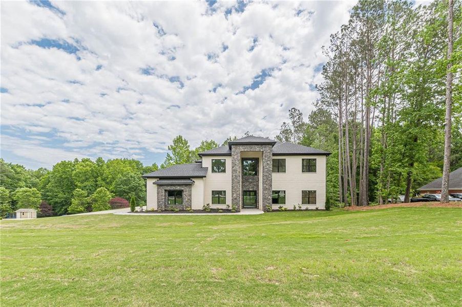 Front exterior of a new home in , McDonough, GA, highlighting curb appeal (Image 31).