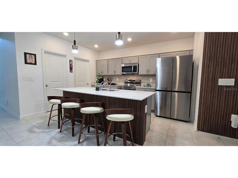 Furnished interior view inside a new home in Cascades, Davenport (Image 13).