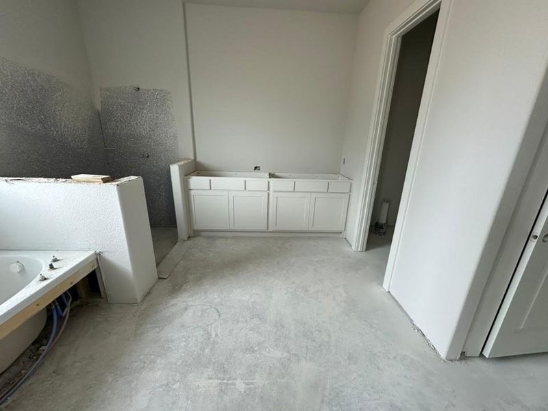 Bathroom with a garden tub and a walk in shower