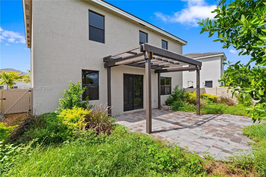 Exterior details and patio area of a home in Parker Pointe, Homestead (Image 24). Exterior details and patio area of a home in Parker Pointe, Homestead (Image 24).