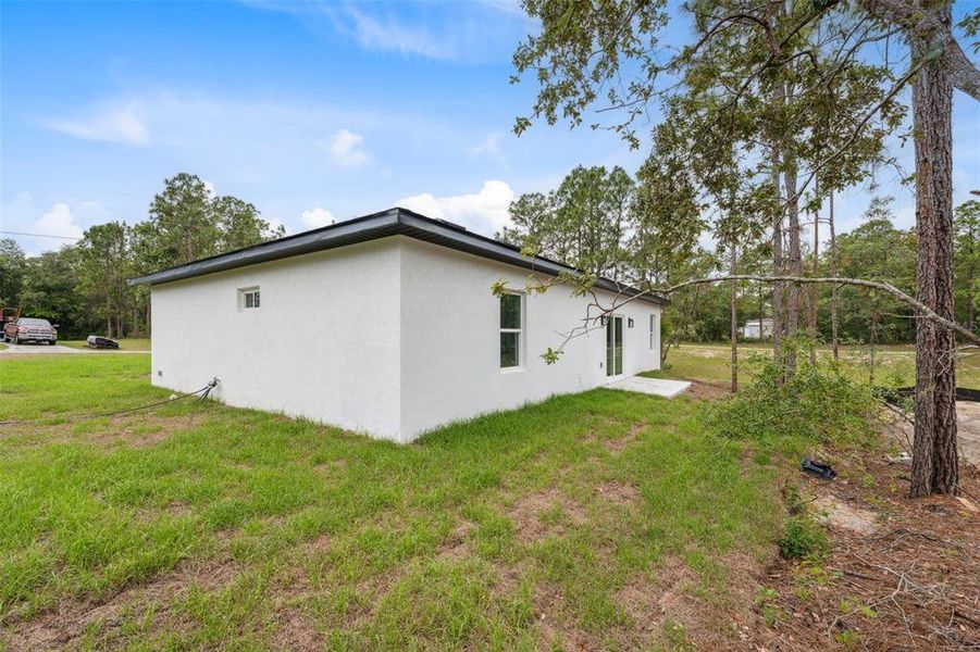 Front exterior of a new home in , Citrus Springs, FL, highlighting curb appeal (Image 22).