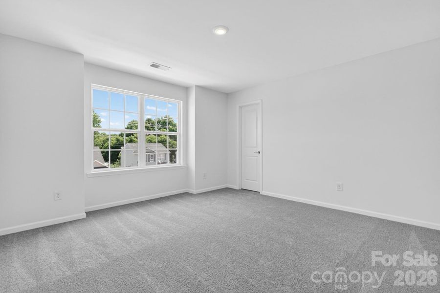 Spacious, unfurnished interior of a new home in The Vines, Charlotte (Image 13).