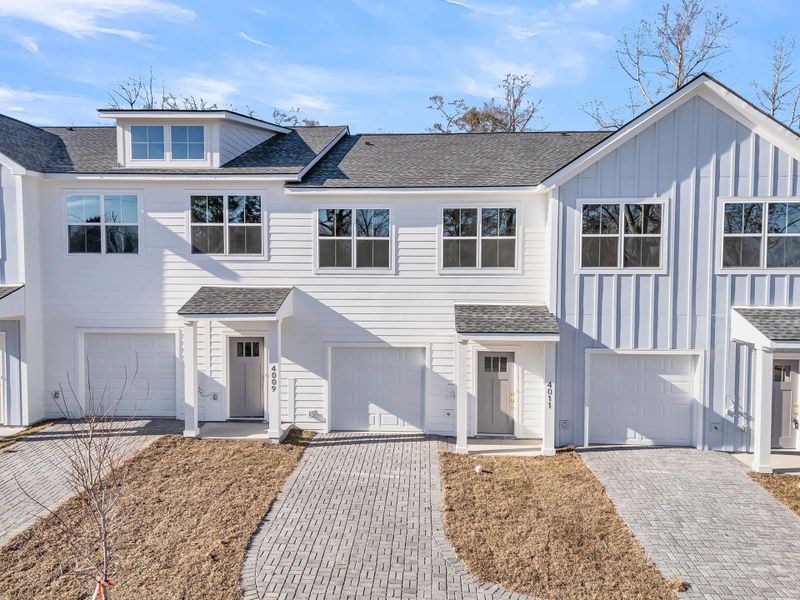 Front exterior of a new home in , North Charleston, SC, highlighting curb appeal (Image 27).