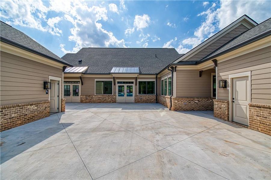 Exterior details and patio area of a home in The Towns at Auburn Station East, Auburn (Image 3).