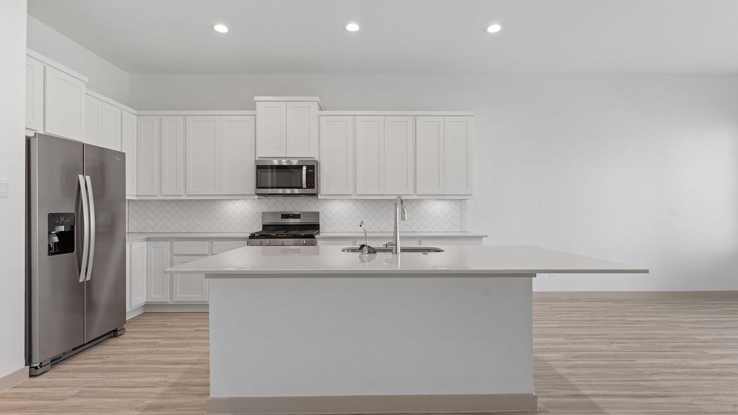Representative furnished interior of a home built from the Plan by D.R. Horton in Davis Harbor, League City (Image 3).