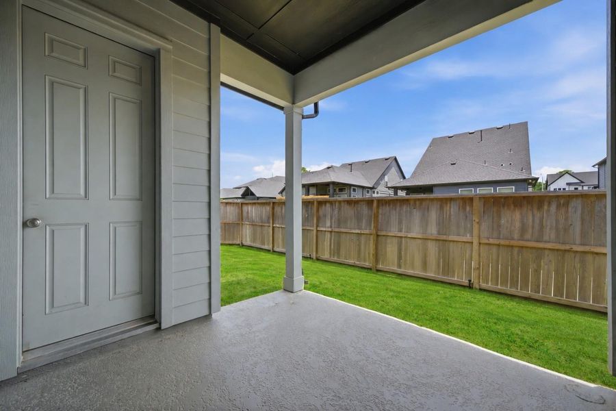 Exterior details and patio area of a home in The Groves 35', Humble (Image 24).