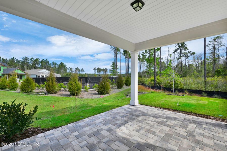 Exterior details and patio area of a home in Westerly Park at Wildlight, Yulee (Image 3).
