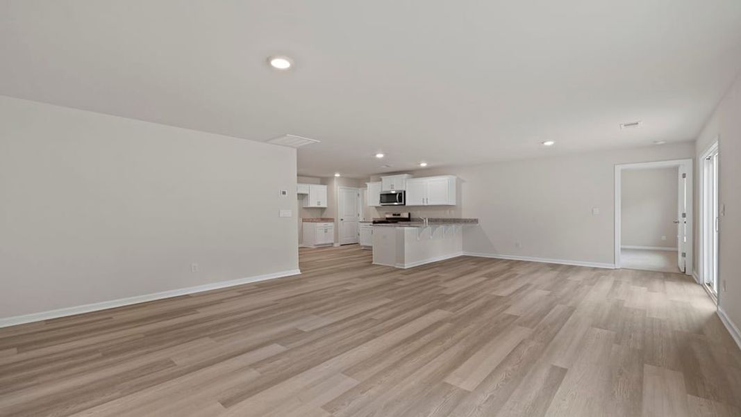 Spacious, unfurnished interior of a new home in Bentley Park, Greenwood (Image 22).