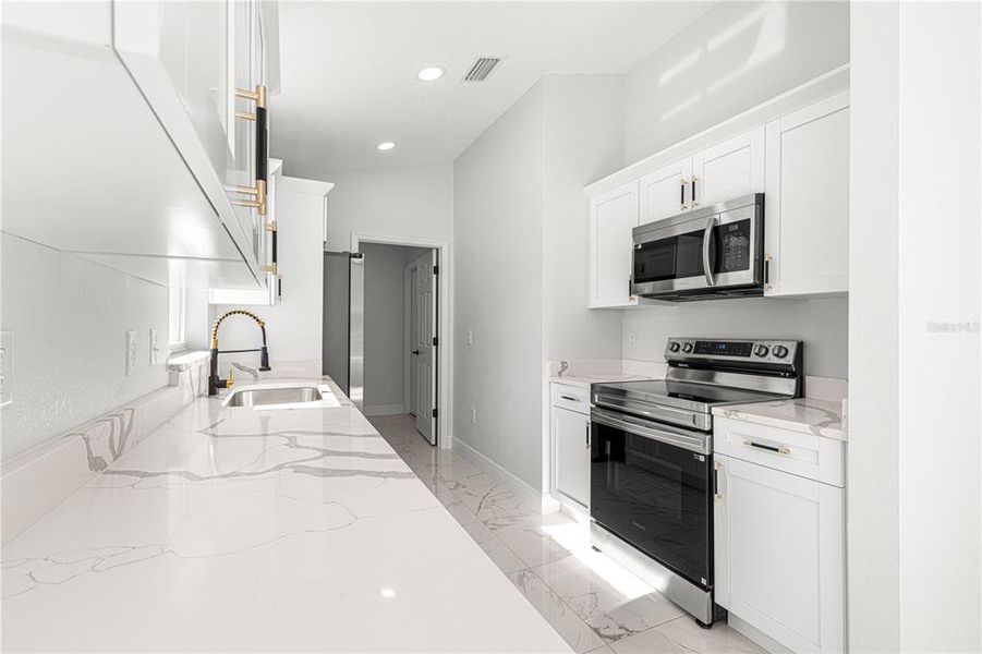 Furnished interior view inside a new home in , Summerfield (Image 3).
