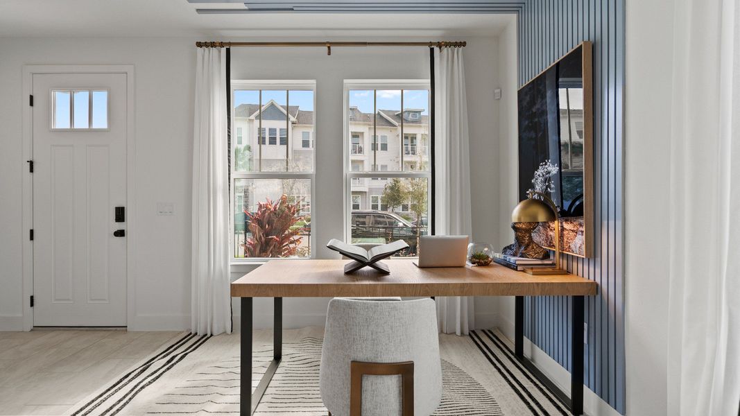 Representative furnished interior of a home built from the Lantana End Unit by DRB Homes in Parkview at Hamlin, Winter Garden (Image 7).