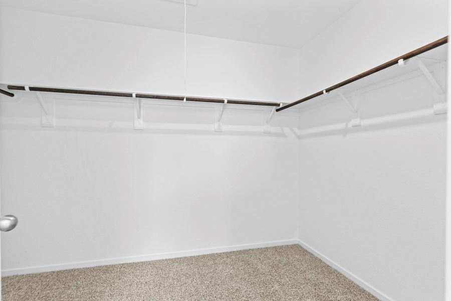 Spacious, unfurnished interior of a new home in Caldwell Crossing, Iowa Colony (Image 14).