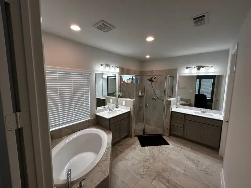 Furnished interior view inside a new home in Grand Central Park 45', Conroe (Image 7).