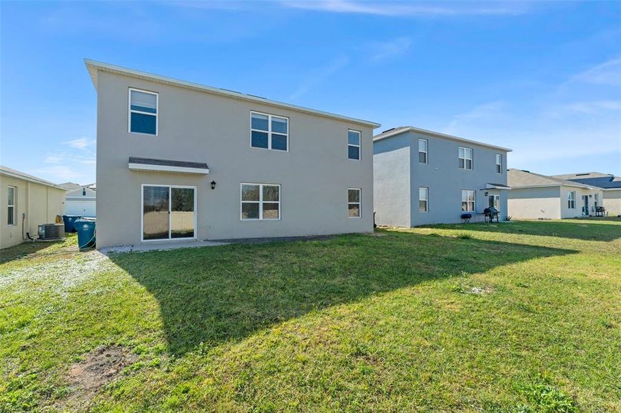 Exterior details and patio area of a home in Grace Ranch, Haines City (Image 4). Exterior details and patio area of a home in Grace Ranch, Haines City (Image 4).