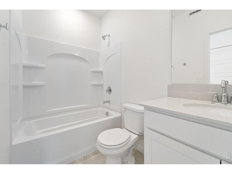 Furnished interior view inside a new home in Liberty Draw, Evans (Image 8).