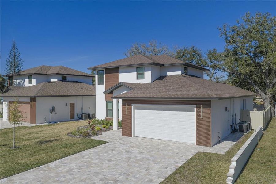 Front exterior of a new home in , Largo, FL, highlighting curb appeal (Image 32).