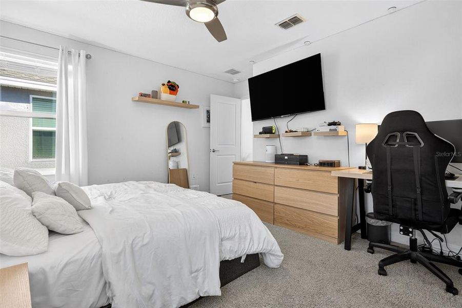 Furnished interior view inside a new home in Storey Park: Innovation Cottage Collection, Orlando (Image 15).