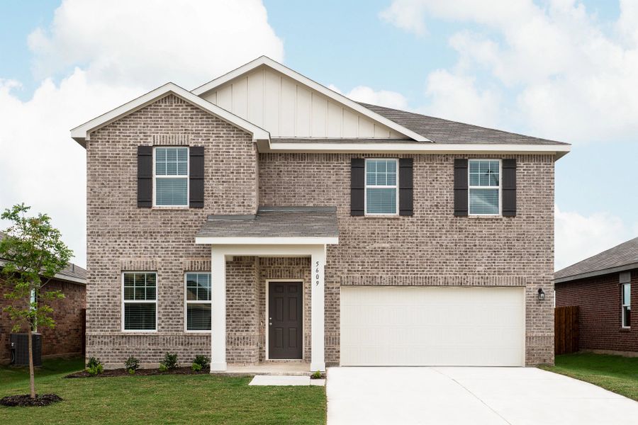 Representative exterior photo of a completed home built from the Solstice by Starlight Homes in Sunterra Lakes, Brookshire, TX (Image 23).