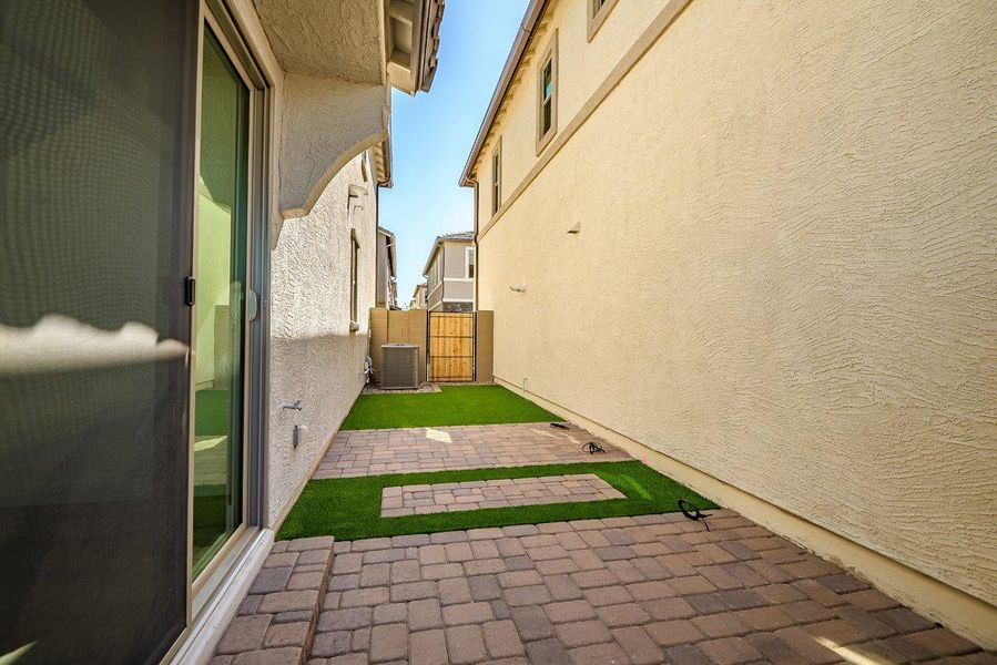 Exterior details and patio area of a home in Ironwood Villages at North Creek, Queen Creek (Image 26).