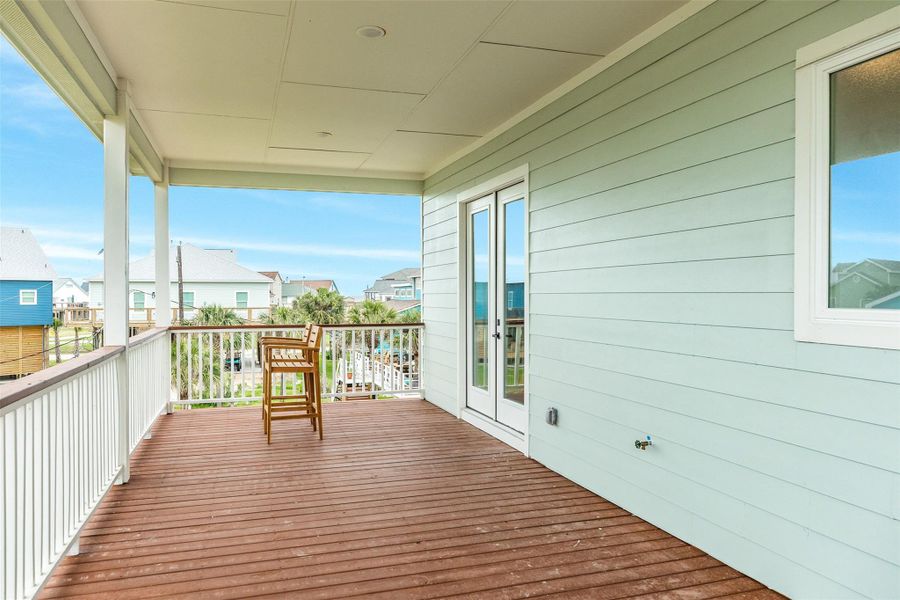 Primary bedroom covered deck Primary bedroom covered deck