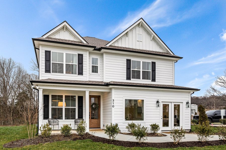 Front exterior of a new home in Sweetgrass Station, Summerville, SC, highlighting curb appeal (Image 1). Front exterior of a new home in Sweetgrass Station, Summerville, SC, highlighting curb appeal (Image 1).