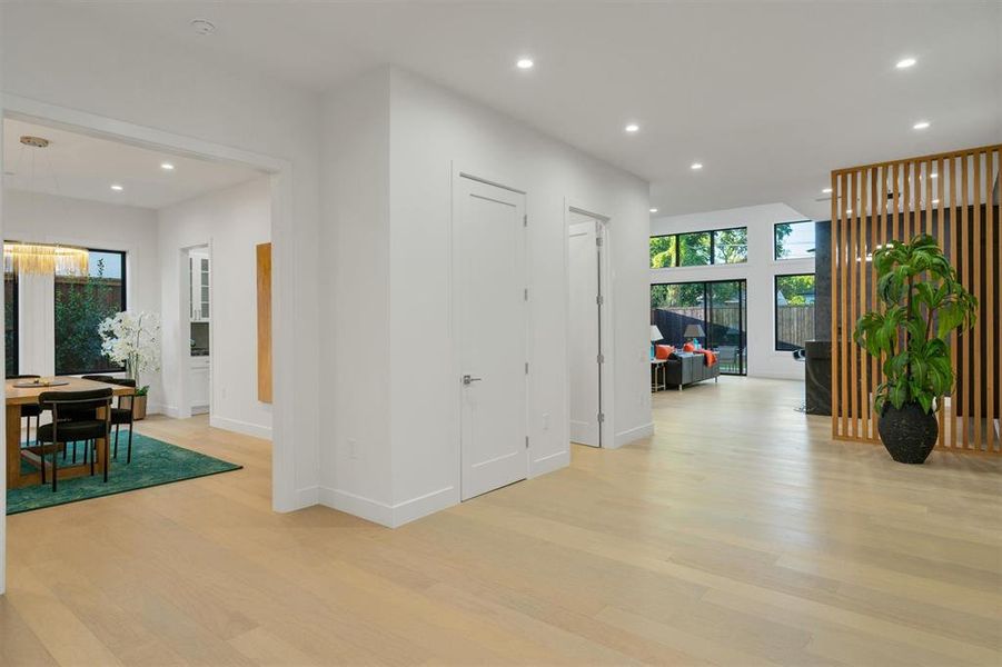 Hall featuring recessed lighting and light wood-type flooring Hall featuring recessed lighting and light wood-type flooring