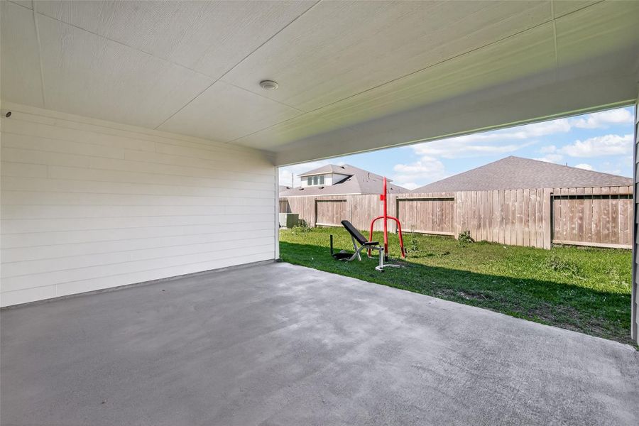 Exterior details and patio area of a home in Windstone on the Prairie, Richmond (Image 28).