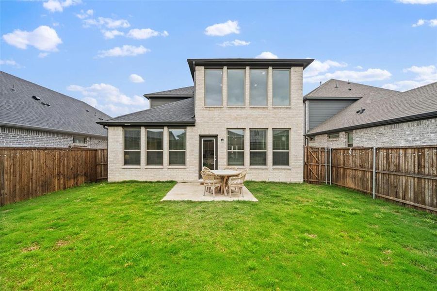 Exterior details and patio area of a home in Eastridge, McKinney (Image 21).