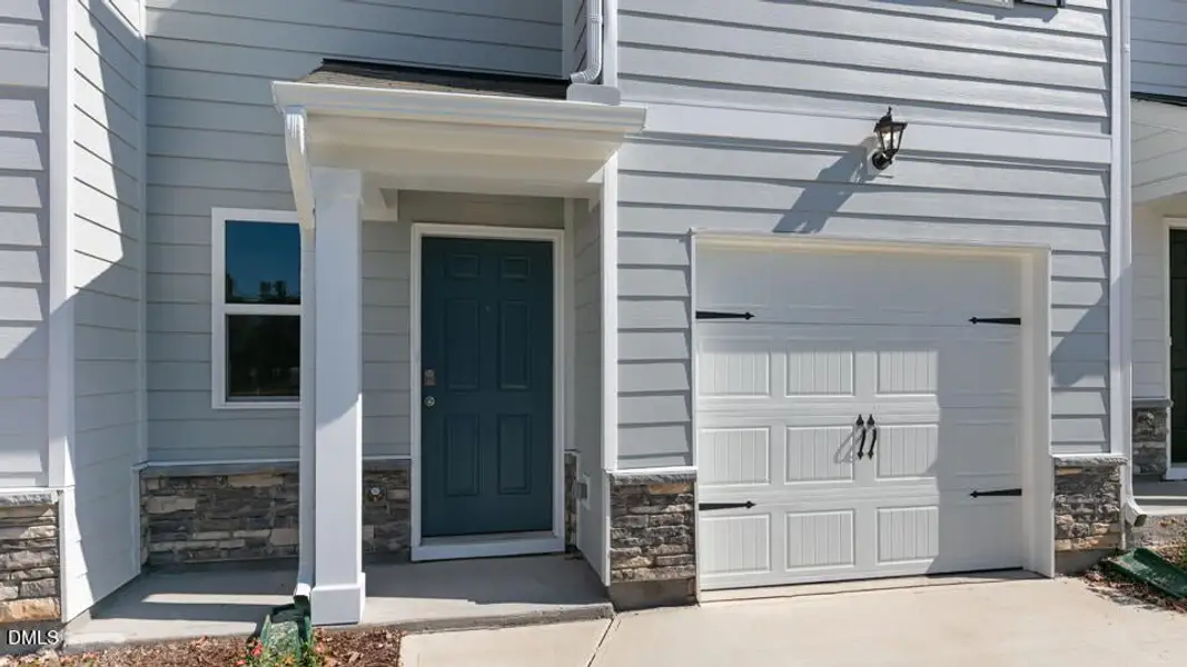 Exterior details and patio area of a home in The Townes at Ridgewood Farms, Winterville (Image 3).