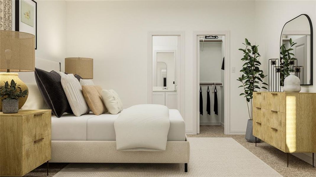 Bedroom with light carpet, ensuite bath, and a walk in closet