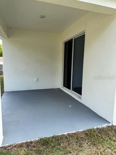 Exterior details and patio area of a home in Hernando County Spot Lots, Spring Hill (Image 21).
