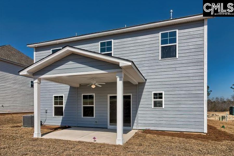 Exterior details and patio area of a home in Cottages at Roofs Pond, West Columbia (Image 22).