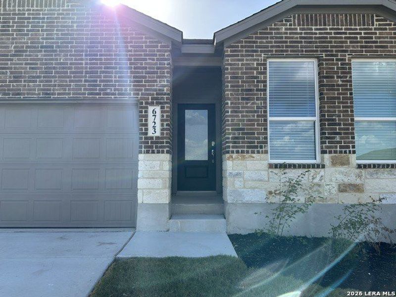 Exterior details and patio area of a home in Juniper Ranch, Spring Branch (Image 17).