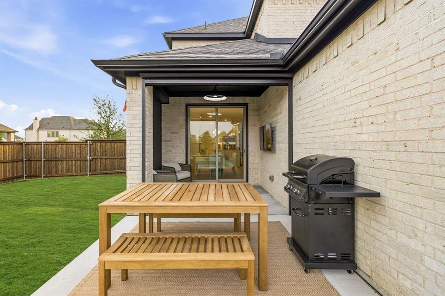 Exterior details and patio area of a home in , The Colony (Image 22).