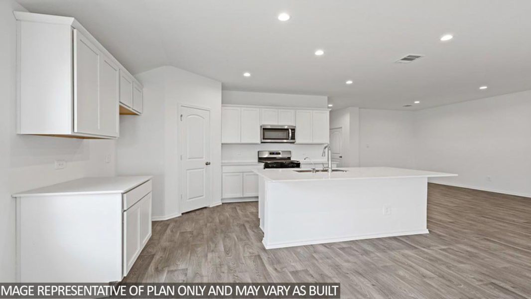 Furnished interior view inside a new home in Sunterra Lakes, Brookshire (Image 5).