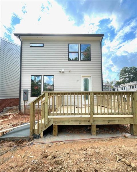 Front exterior of a new home in The Village at Towne Lake, Woodstock, GA, highlighting curb appeal (Image 44).